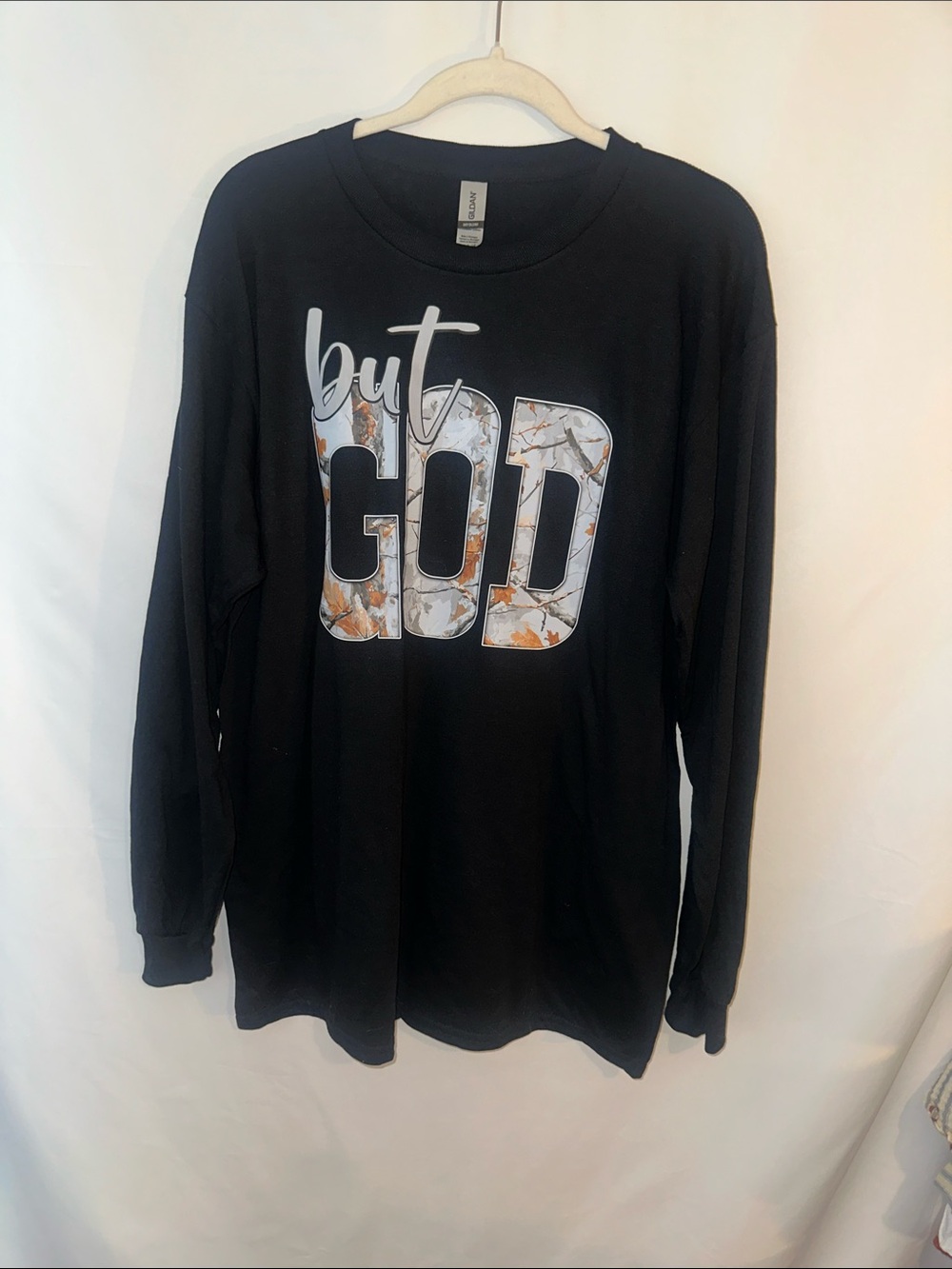 Gildan Black Long-Sleeve Tee with 'but GOD' Camo Lettering